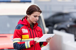 female-emt-holding-tablet