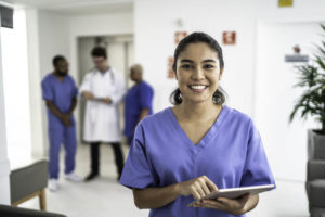 healthcare-professionals-holding-tablet