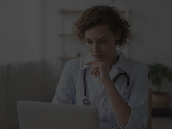 nurse-with-stethoscope-using-laptop