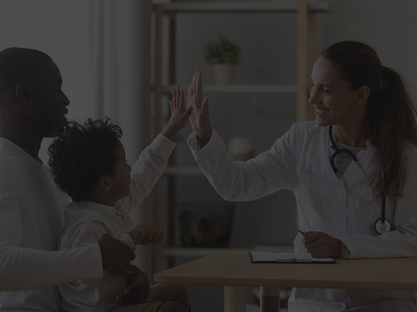 high-five-with-child-patient-with-pedia